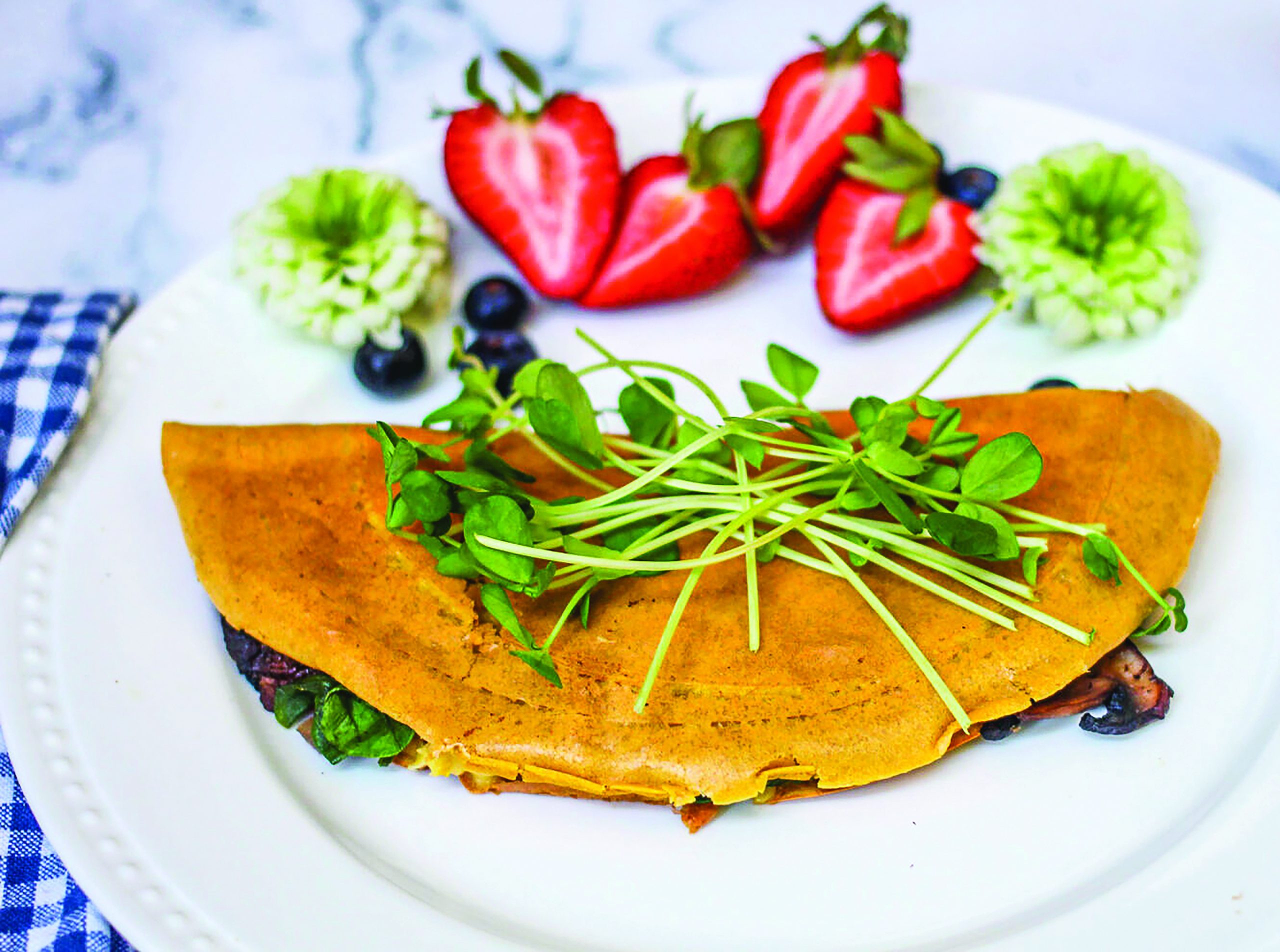Vegan Chickpea Crepes with Mushrooms, Cheese, and Spinach - Delicious Living