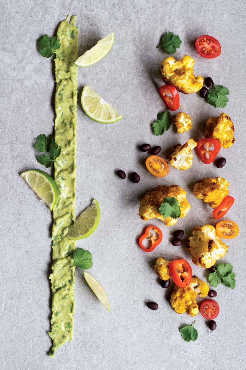 Cauliflower and Black Bean “Nachos” with Creamy Avocado Dip Delicious