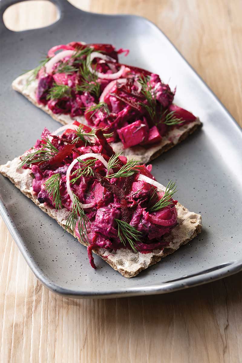 Herring Beet Apple Salad on Rye Crisps - Delicious Living