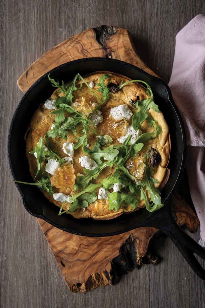 Dutch Baby with Goat Cheese, Figs, Chili Flakes, and Raw Honeycomb